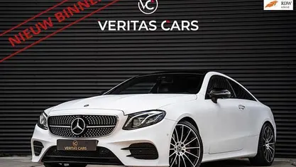 Wit Gebruikt 2017 Mercedes E220 AMG line Coupé | € 30.950 (Eerlijke prijs)
