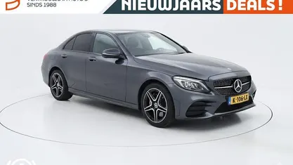 Grijs Occasion 2021 Mercedes C300e AMG Sedan | € 30.745 (Eerlijke prijs)