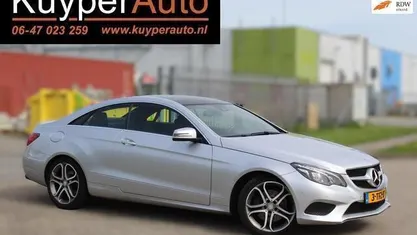 Occasion Mercedes E200 Prestige 184 PK (135 kW) 2014 Grijs, metallic lak Coupé