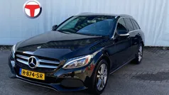 Zwart, metallic lak Gebruikt 2014 Mercedes C180 Prestige Stationwagen | € 16.395 (Eerlijke prijs)