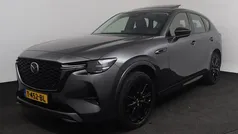 Machine gray (grijs metallic) Gebruikt 2023 Mazda CX-60 Homura-Line SUV | € 44.750 (Eerlijke prijs)