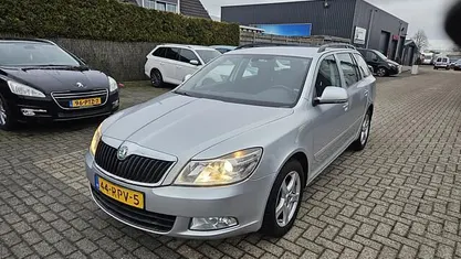 Occasion Skoda Octavia Business Line 105 PK (77 kW) 2011 Grijs Stationwagen