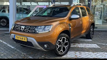 Oranje Gebruikt 2018 Dacia Duster Prestige SUV | € 14.590 (Eerlijke prijs)