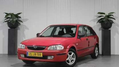 Occasion Mazda 323 88 PK (64 kW) 1999 Rood Hatchback