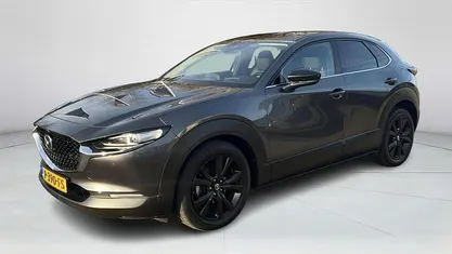Machine gray Gebruikt 2022 Mazda CX-30 Sportive SUV | € 23.850 (Eerlijke prijs)