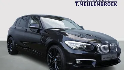 Zwart Gebruikt 2015 BMW 118 Urban Line Hatchback | € 8.450 (Eerlijke prijs)