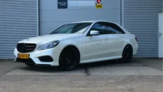 Wit, metallic lak Gebruikt 2015 Mercedes E300 AMG Sedan | € 14.999 (Eerlijke prijs)