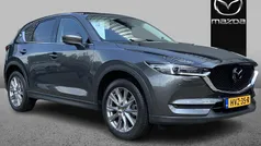 Machine gray metallic (46g) Gebruikt 2021 Mazda CX-5 Luxury SUV | € 33.895 (Eerlijke prijs)
