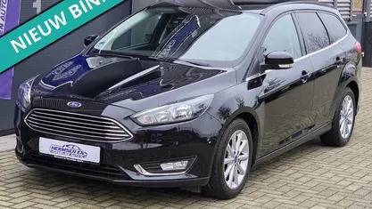 Zwart (metallic) Gebruikt 2015 Ford Focus Titanium Stationwagen | € 7.950 (Eerlijke prijs)