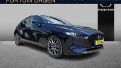 Deep crystal blue Gebruikt 2024 Mazda 3 Exclusive-Line Hatchback | € 26.895 (Eerlijke prijs)