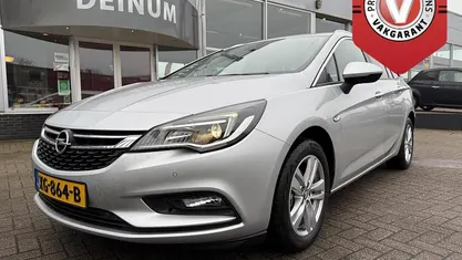 Zilver (metallic) Gebruikt 2018 Opel Astra Edition Stationwagen | € 11.900 (Eerlijke prijs)