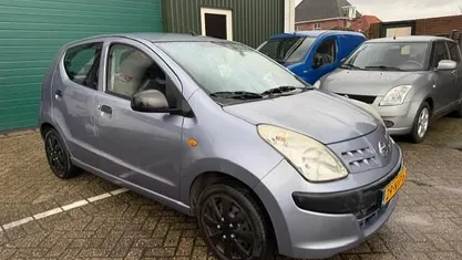 Occasion Nissan Pixo Visia 68 PK (50 kW) 2011 Grijs Hatchback