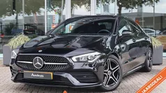 Zwart Gebruikt 2021 Mercedes 180 AMG line Sedan | € 28.900 (Eerlijke prijs)