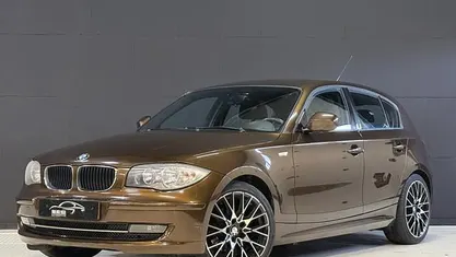 Bruin Gebruikt 2011 BMW 116 Hatchback | € 6.900 (Eerlijke prijs)