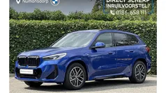 Blauw, metallic lak Gebruikt 2024 BMW iX1 M Sport SUV | € 43.895 (Goede deal)