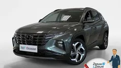 Amazon gray metallic/amazon grey pearl metallic (a5g) Gebruikt 2024 Hyundai Tucson Premium SUV | € 39.450 (Eerlijke prijs)