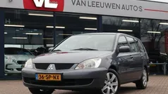 Grijs, metallic lak Gebruikt 2006 Mitsubishi Lancer Inform Stationwagen | € 1.448 (Eerlijke prijs)