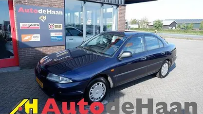 Blauw Gebruikt 1999 Mitsubishi Carisma Hatchback | € 795 (Eerlijke prijs)