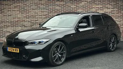 Occasion BMW 320 M Performance 184 PK (135 kW) 2023 Zwart Stationwagen