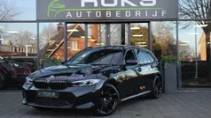 Zwart Gebruikt 2022 BMW 320e Executive Stationwagen | € 40.950 (Eerlijke prijs)