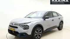 Grijs Gebruikt 2022 Citroën e-C4 Feel SUV | € 19.950 (Eerlijke prijs)