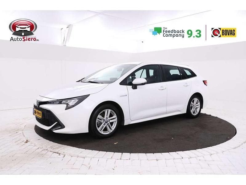 Wit (metallic) Gebruikt 2021 Toyota Corolla Active Stationwagen | € 20.995 (Goede deal) - Afbeelding 1/4