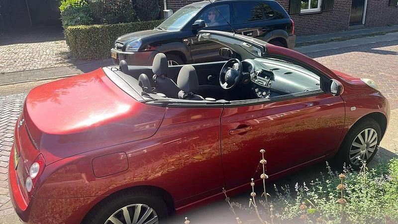 Rood Occasion 2006 Nissan Micra Tekna Hatchback | € 2.600 (Iets duurder) - Afbeelding 1/4