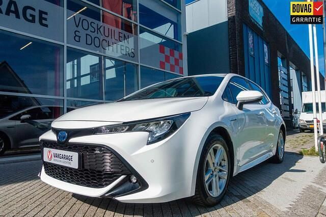Wit Gebruikt 2021 Toyota Corolla Hybrid Comfort Hatchback | € 22.950 (Duur) - Afbeelding 1/4