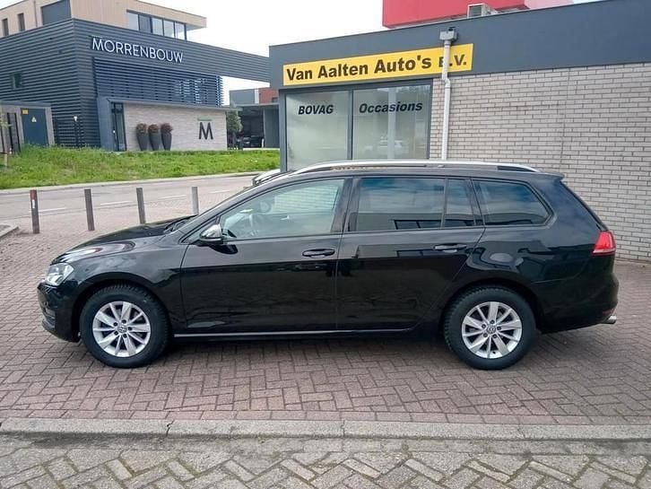 Zwart, metallic lak Gebruikt 2014 VW Golf VII Trendline Stationwagen | € 7.950 (Eerlijke prijs) - Afbeelding 1/4