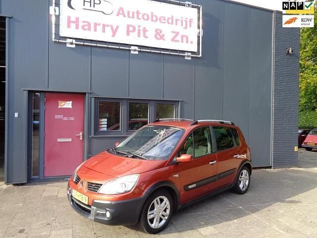 Oranje Gebruikt 2009 Renault Scénic III MPV | € 2.995 (Eerlijke prijs) - Afbeelding 1/4