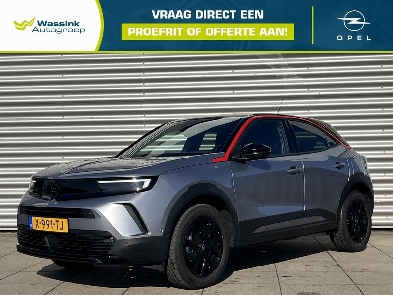 Grijs Gebruikt 2024 Opel Mokka SUV | € 24.740 (Iets duurder) - Afbeelding 1/4