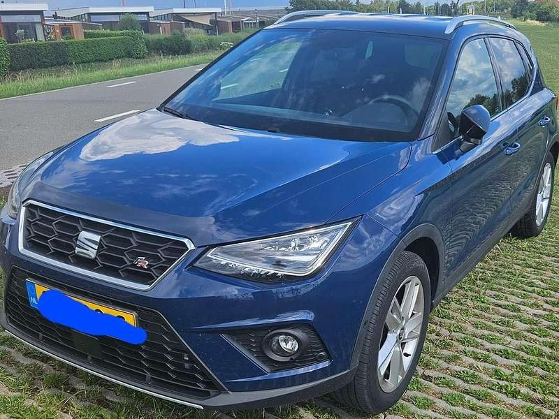 Blauw Gebruikt 2018 Seat Arona FR SUV | € 16.995 (Eerlijke prijs) - Afbeelding 1/4