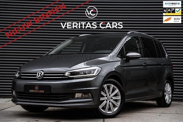 Grijs Gebruikt 2016 VW Touran Highline MPV | € 21.450 (Eerlijke prijs) - Afbeelding 1/4