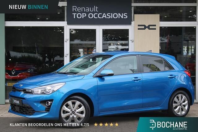 (spb) sporty blue m Gebruikt 2021 Kia Rio Start Hatchback | € 15.450 (Eerlijke prijs) - Afbeelding 1/4