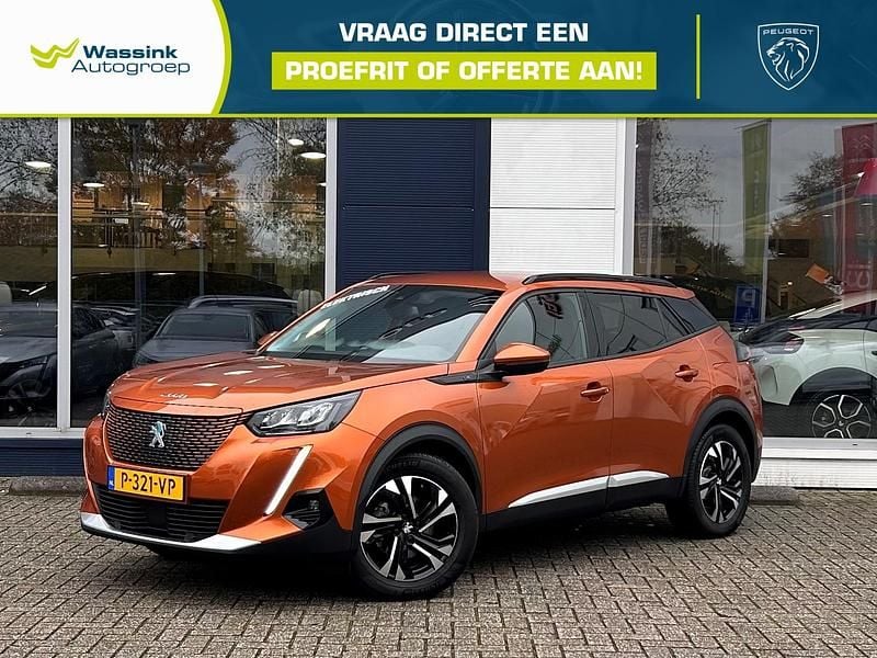 Oranje Gebruikt 2021 Peugeot e-2008 Allure SUV | € 17.885 (Goede deal) - Afbeelding 1/4