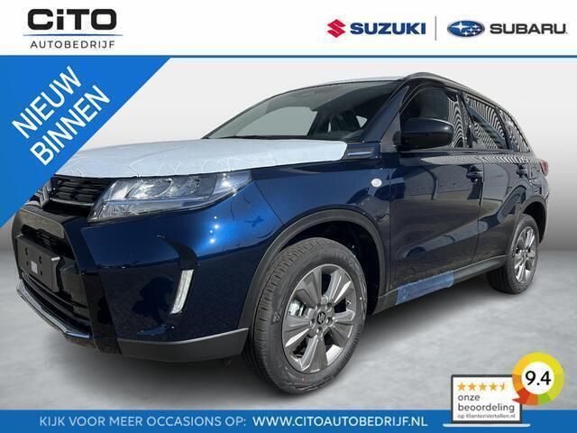 Blauw Nieuw 2025 Suzuki Vitara SUV | € 31.348 (Eerlijke prijs) - Afbeelding 1/4