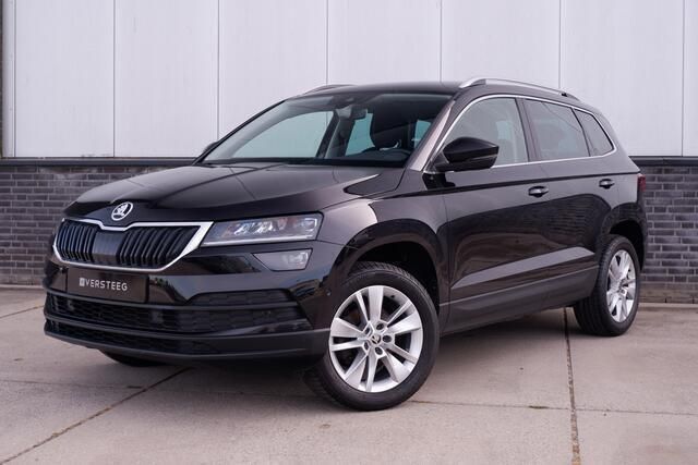 Zwart Gebruikt 2019 Skoda Karoq Style SUV | € 21.900 (Eerlijke prijs) - Afbeelding 1/4