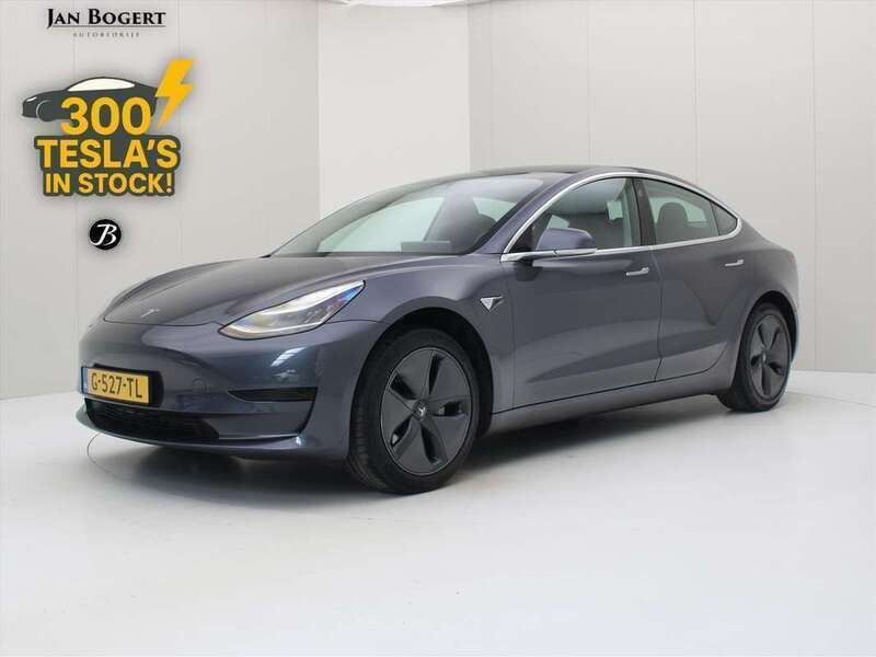 Grijs, metallic lak Gebruikt 2019 Tesla Model 3 Standard Range Sedan | € 17.999 (Eerlijke prijs) - Afbeelding 1/4