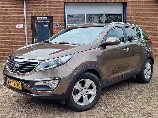 Bruin Gebruikt 2013 Kia Sportage Plus SUV | € 10.950 (Eerlijke prijs) - Afbeelding 1/4