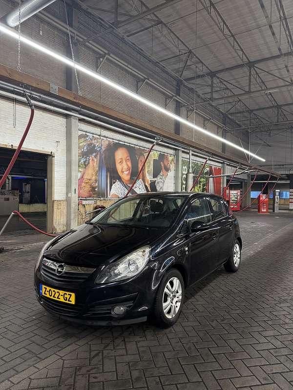 Zwart Gebruikt 2010 Opel Corsa Cosmo MPV | € 2.500 (Goede deal) - Afbeelding 1/4