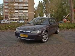 Paars Gebruikt 2000 Mazda 323 Hatchback | € 750 (Eerlijke prijs)