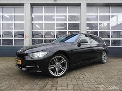Zwart Gebruikt 2013 BMW 320 Executive Stationwagen | € 7.999 (Goede deal)