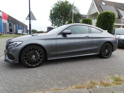 Grijs, metallic lak Gebruikt 2016 Mercedes C180 AMG line Coupé | € 24.950 (Iets duurder)