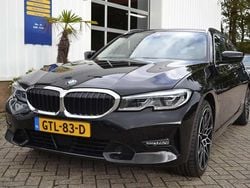 Zwart Gebruikt 2021 BMW 330e Executive Stationwagen | € 29.950 (Goede deal)