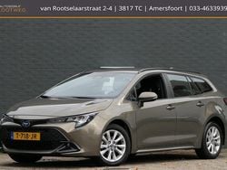 Groen Gebruikt 2023 Toyota Corolla Hybrid Stationwagen | € 25.650