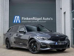Grijs Gebruikt 2022 BMW 330e Executive Stationwagen | € 35.800 (Goede deal)