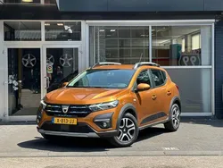 Oranje Gebruikt 2022 Dacia Sandero Comfort Hatchback | € 15.995 (Eerlijke prijs)