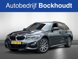 Grijs Gebruikt 2021 BMW 330 Executive Stationwagen | € 35.900 (Eerlijke prijs)