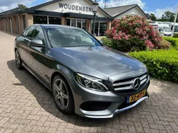 Grijs, andere lak Gebruikt 2018 Mercedes C180 AMG Sedan | € 23.750 (Goede deal)