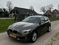 Bruin Gebruikt 2013 BMW 118 Executive Hatchback | € 11.500 (Eerlijke prijs)